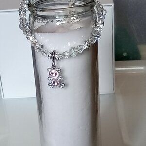 Handmade beaded glass bracelet with charms  Size 7in. Color White